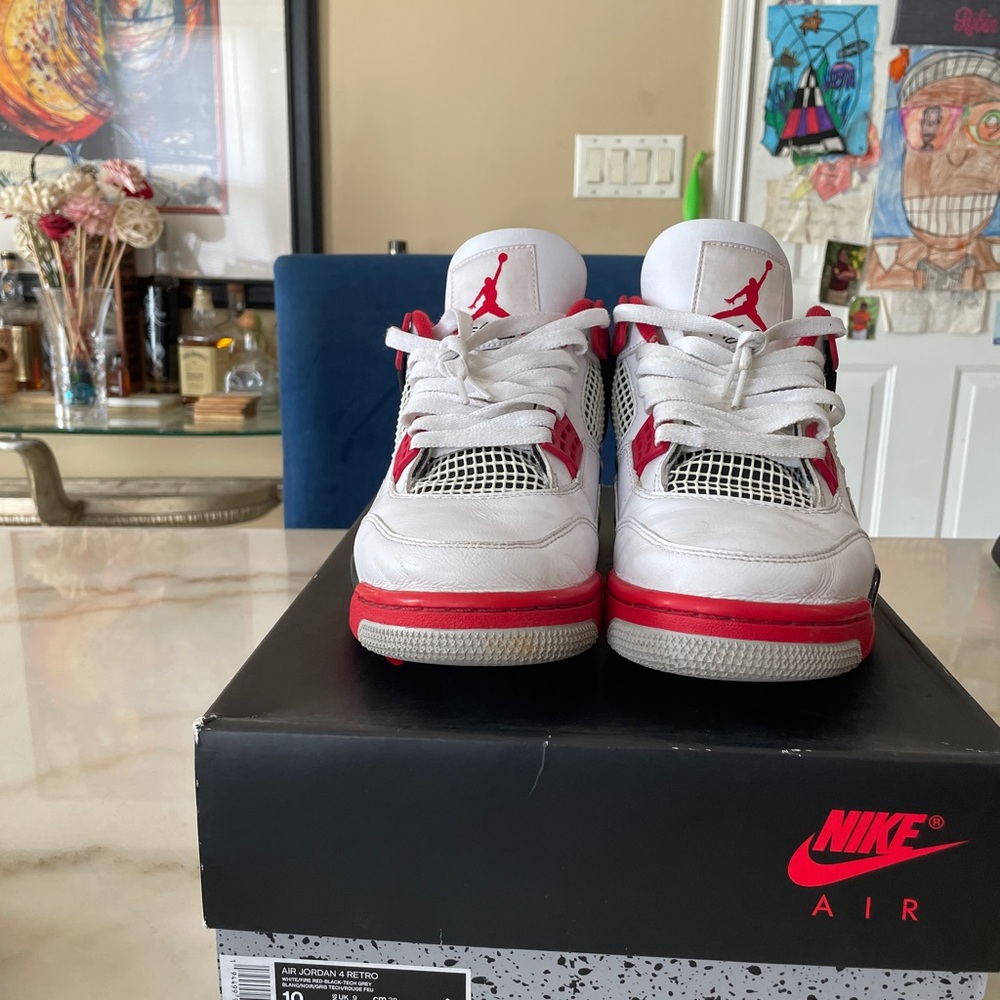 Nike Air Jordan 4 White and Red Sneakers